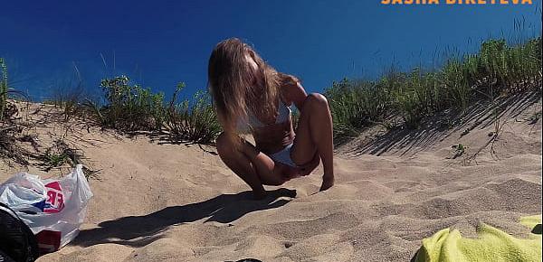  PISS PISS TRAVEL - Russian nudist girl Sasha Bikeyeva pissing on a public beach Doninos on Galicia Spain